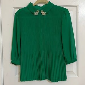Green Ted Baker sz 3. (Fits like a medium). Pleated. 3/4 sleeves. Gold accents